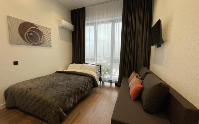 Апартаменты на проспекте Окружной 10Б