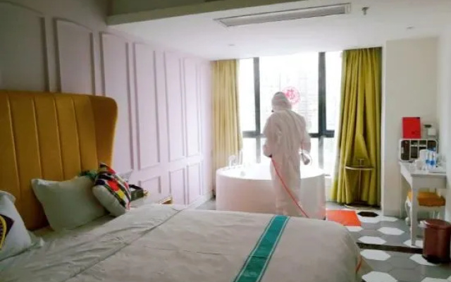 Haikou Green Orange Theme Hotel (Wuyue Plaza, East High-speed Railway Station) – Guest Rooms – Haikou