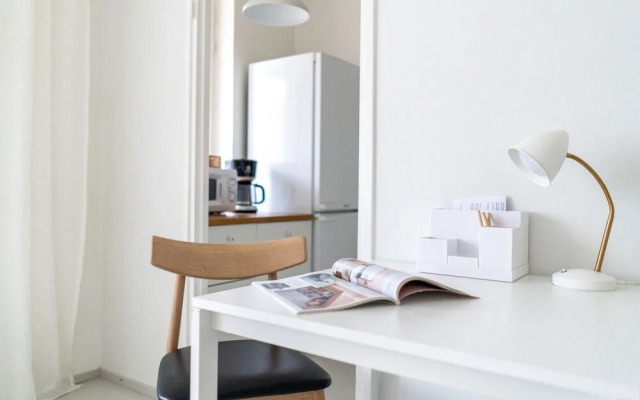 Upper floor studio with a balcony