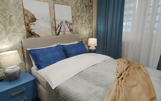 Апартаменты Как дома на улице Валентины Гризодубовой 1