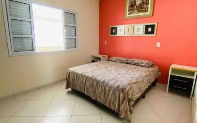 Casa de praia com piscina e churrasqueira - Indaiá Bertioga