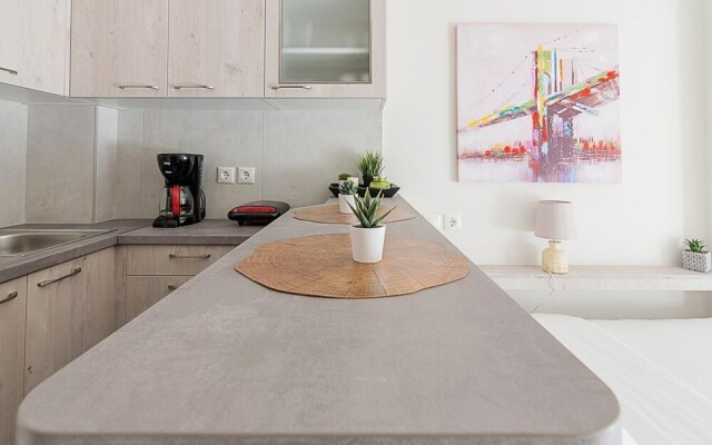 Modern Athens Studio by Cloudkeys
