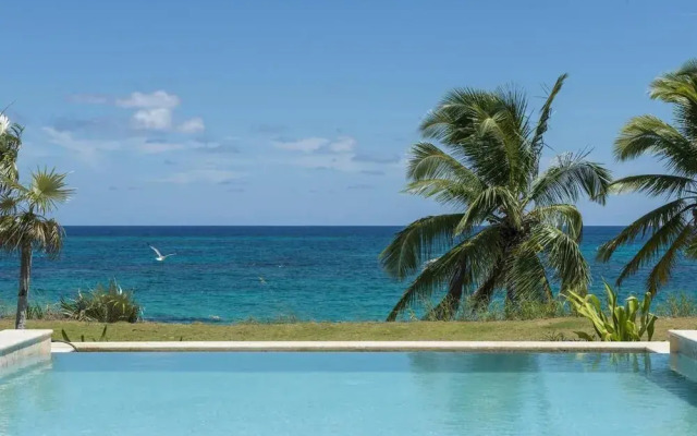 Dream Villa: Private Oasis Above Pink Sand Beach