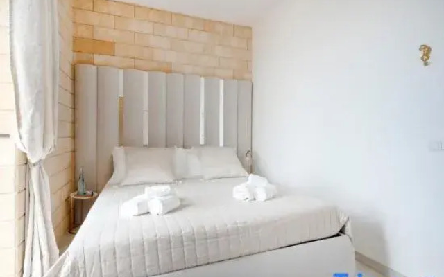 Terra | 2-Bedroom with Shared Kitchen & Balcony – Seafront Location