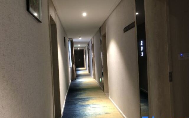 Jasmine Bloom INN Chain Hotel (Yidu Chengxiang Road)