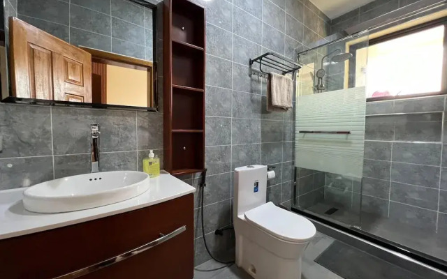 Q-Plus Apartments
