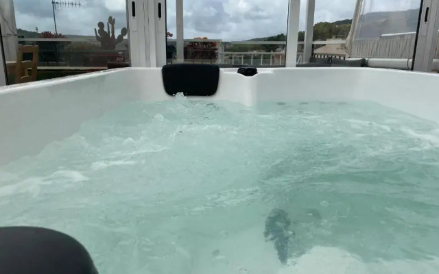 La Olivera APARTHotel Rural Suites bañera hidro o Jacuzzi privados