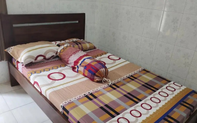 OYO 91233 Bismo 85 Family Syariah