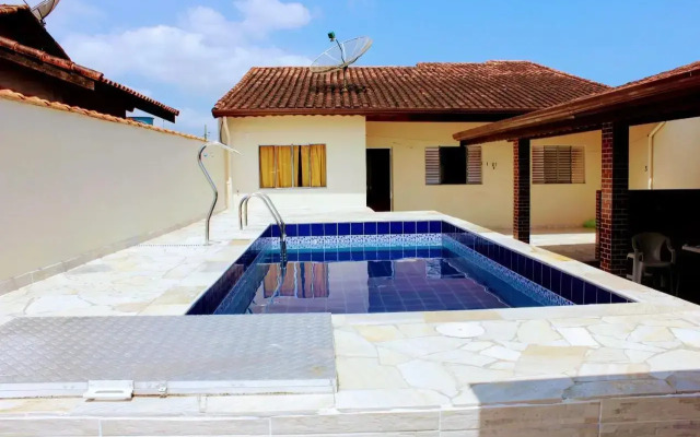 Casa com piscina no litoral norte