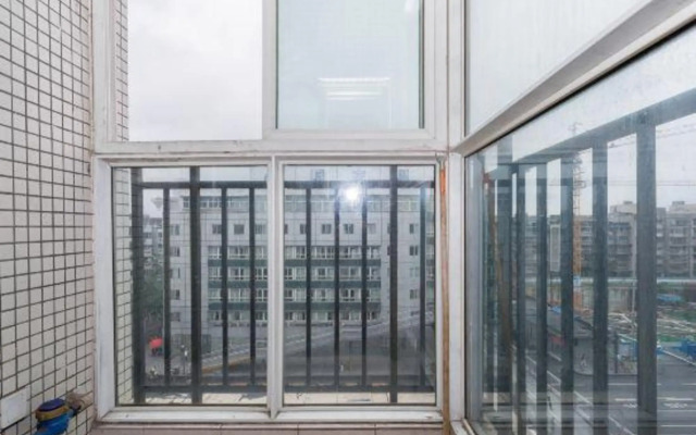 Qingqing Wojia Hotel Style Apartment