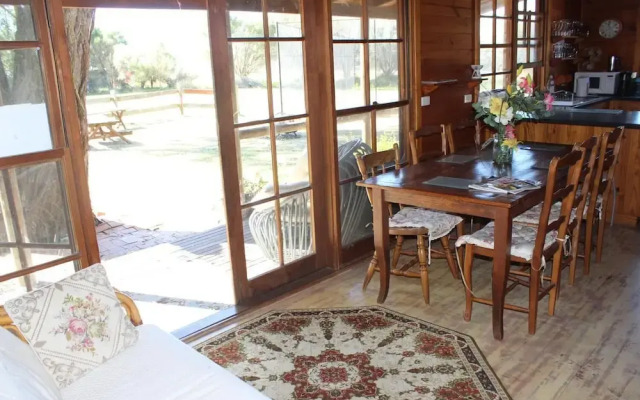 Krinklewood Cottage and Train Carriages