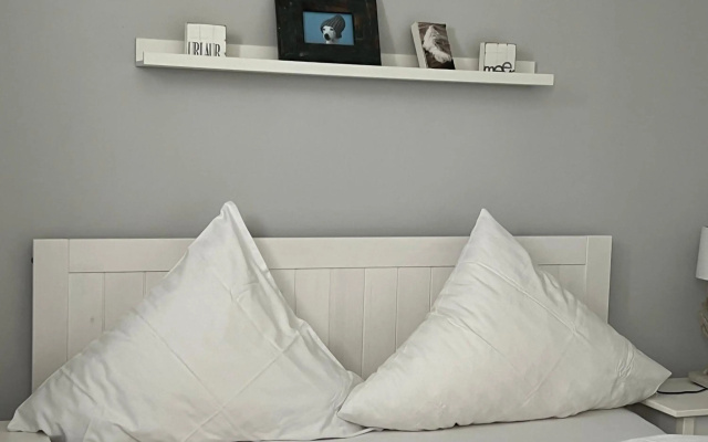 Strandvogt - wunderschöne Ferienwohnung mit Parkettboden und Sonnenbalkon