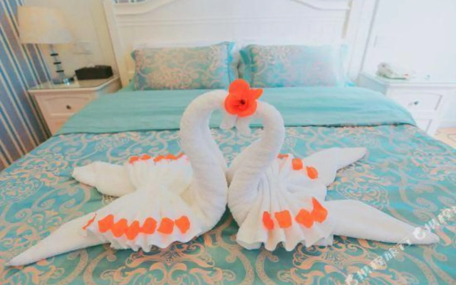 Merry Home Hotel (Leshan Giant Buddha Minjiang 2nd Bridge)