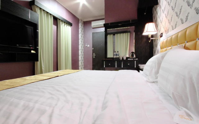 Amos Cozy Hotel & Convention Hall