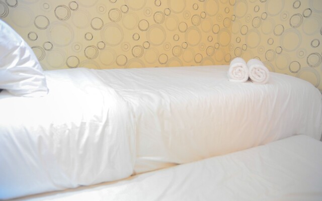 Homey and Relaxing 2BR Green Pramuka Apartment