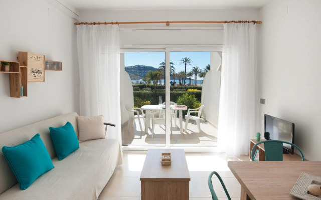 Apartamento a pie de playa, climatizado y parking