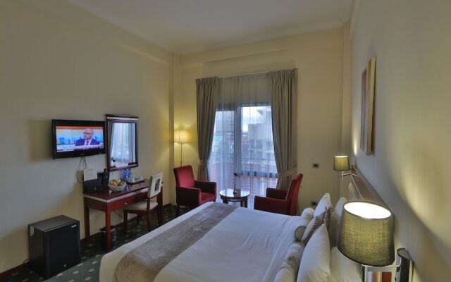 Kenenisa.. Oasis International Hotel