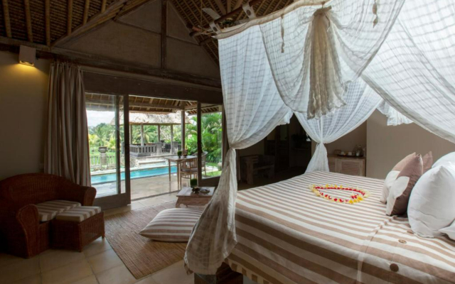 Курортный отель Wapa di Ume Ubud Resort & Spa