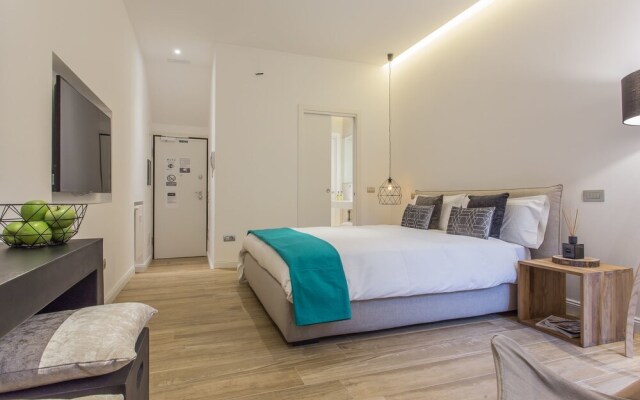 Erïk Langer Cesare Battisti Suites
