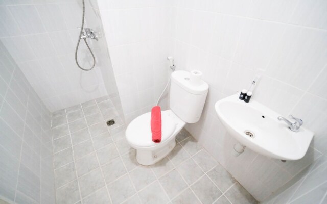 Cozy Living And Tidy 2Br At Puncak Dharmahusada Apartment