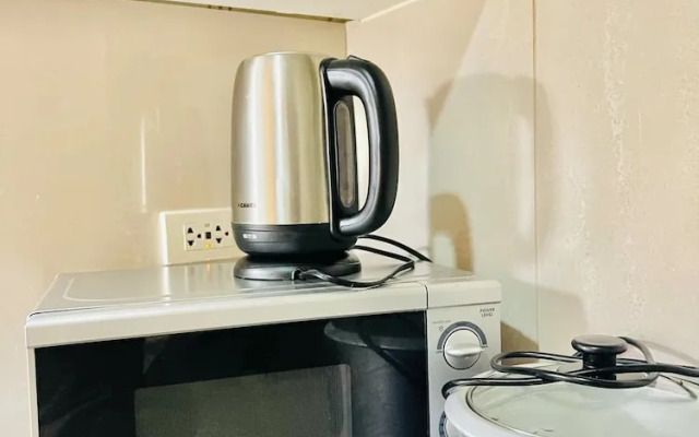 Mactan cozy 1 bedroom with 3 beds