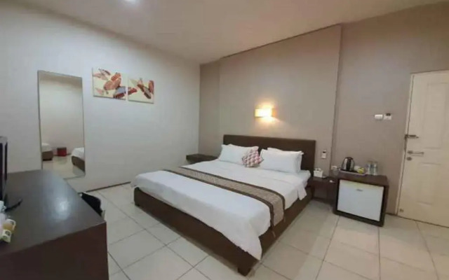 OYO 90075 Feliz Hotel