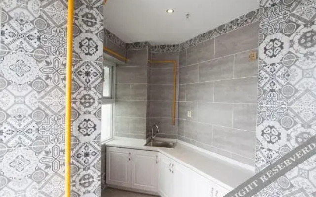 Qiziyuan Theme Apartment Hotel
