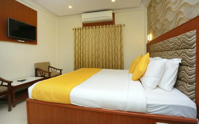 Capital O 14702 Kovilakam Residency