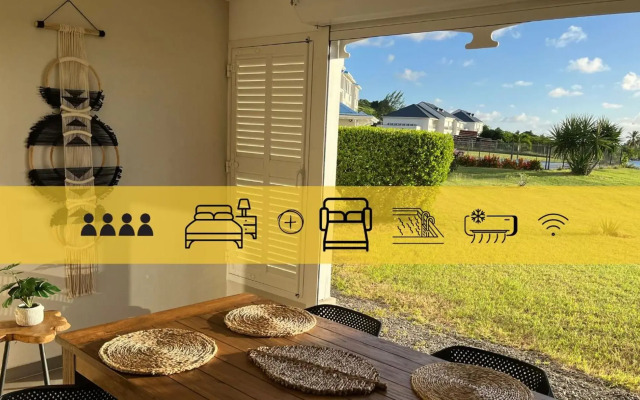 Le Baileys - Spacieux appartement en rez-de-jardin vue lagon