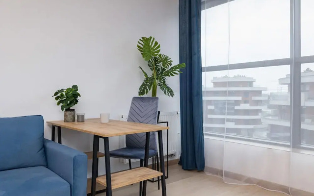 Dark Blue Apartment in Kraków by Renters