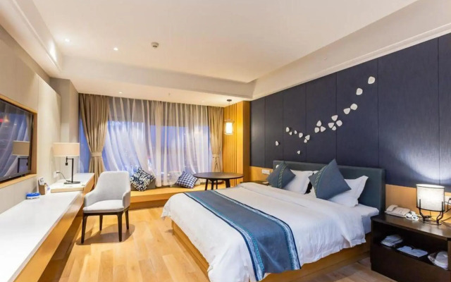 Guoguo Hotel (Xingyi Huijin Center Store)