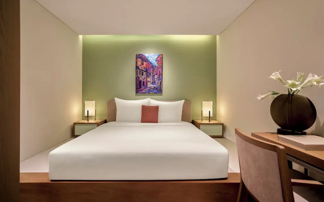 Signature By M Village Beachfront Hotel