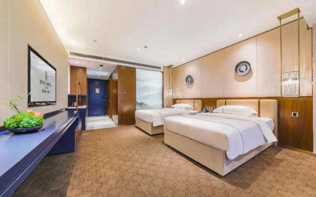 Rezen Heyi Hotel Yizhang