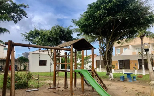 Linda casa frente mar pé na areia praia Flamengo