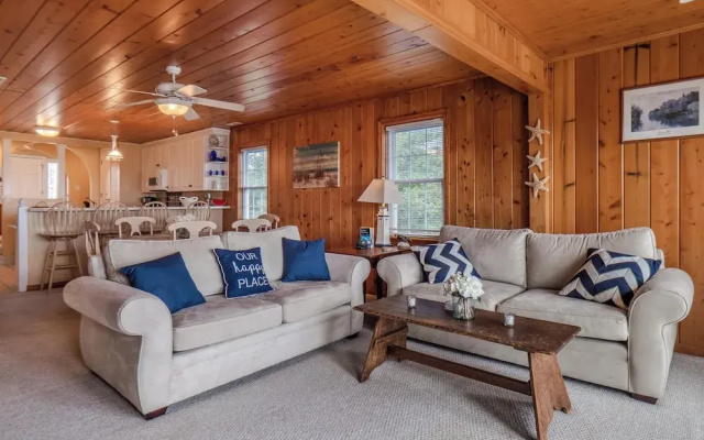 A Charm of Finches by Topsail Realty