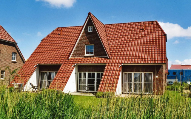 Apartment in Burhave with a shared pool