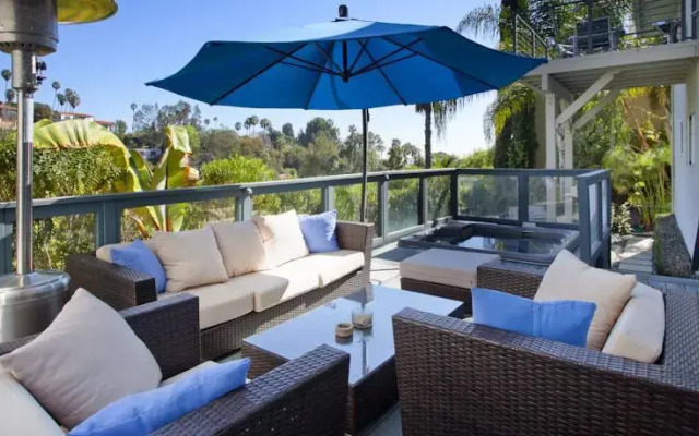 MidCentury Poolview Retreat by LuxPads