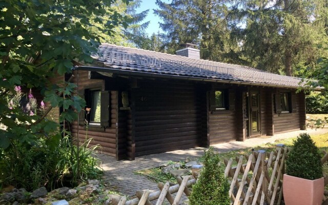 Wooden bungalow with oven, in Oberharz near a lake