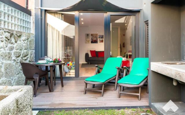 Light-Filled Apartment with Garden • Downtown