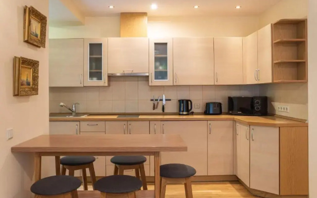 Family-friendly 2 rooms apartment with view to a forest