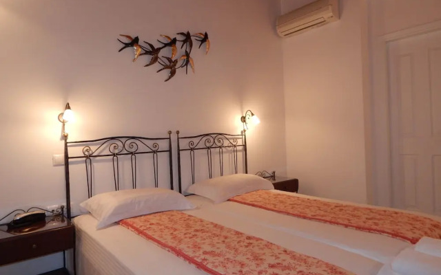 Tinos Suites & Apartments