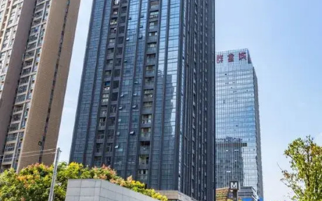 Wuhan Qixin Hotel Apartment (Xudong Wangjiadun Metro)