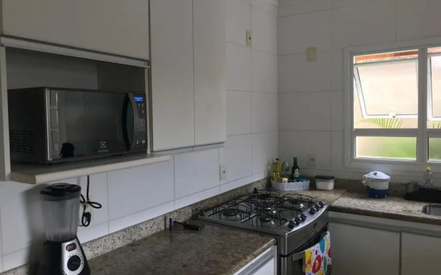 Casa de praia com piscina e churrasqueira - Indaiá Bertioga