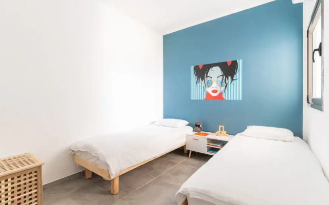 Vibrant Seaside Stay with Balcony by Sea N' Rent