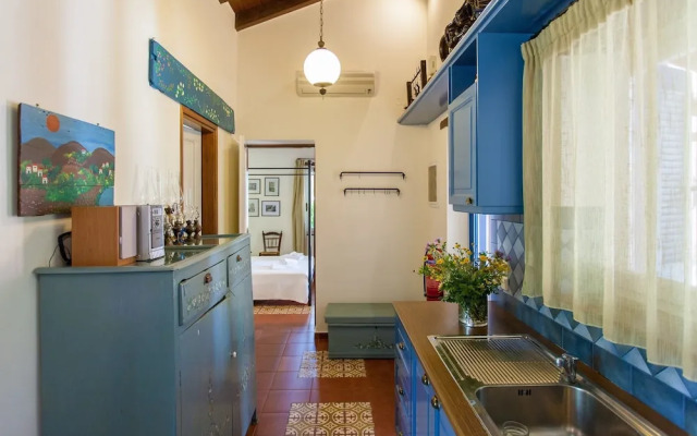 Dine on the Generous Veranda at a Rustic Stone Getaway