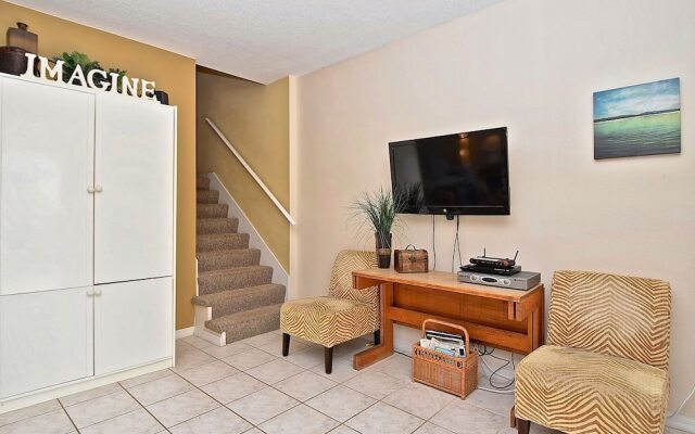 Beach Walk Unit B by Vtrips