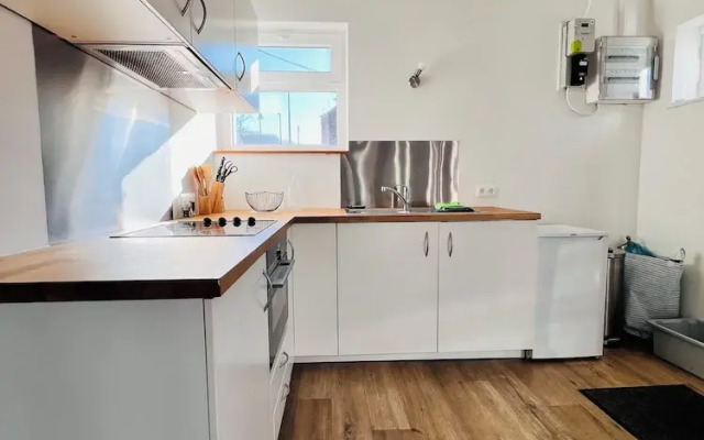 Maison proche rivière avec jardin