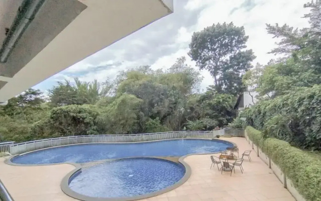 Homey and Comfortable 1BR Apartment at Dago Suites