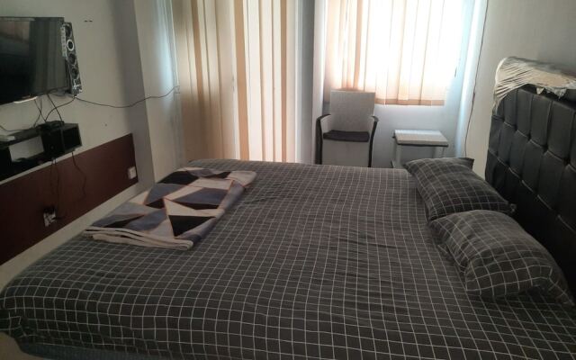 OYO Life 93139 Apartemen Grand Sentraland By Evi