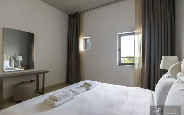 WelHome - Prime 1BR Apartment at Oia Residence